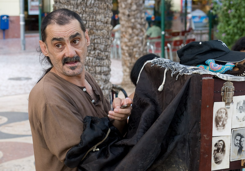 Old-fashioned street photographer