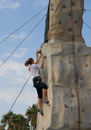 Climbing, Barceloneta beach--she has reached the goal